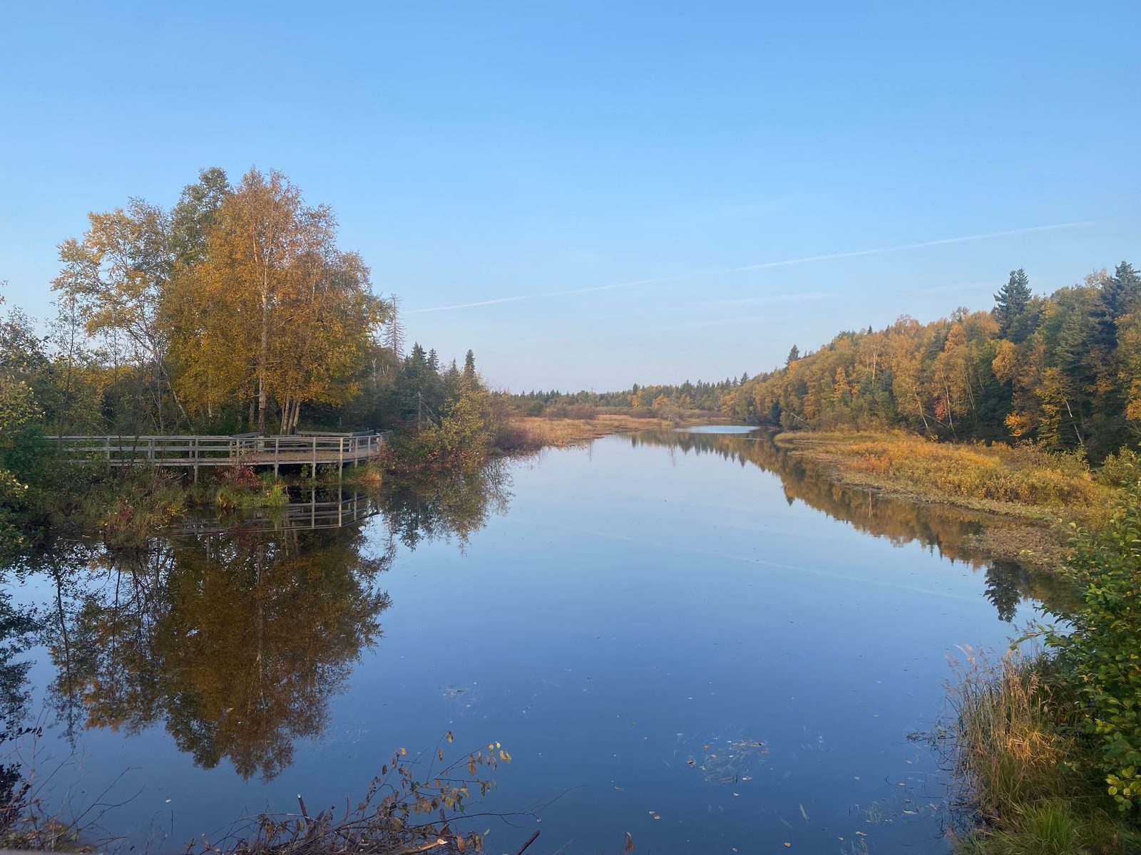 Autumn reflections on river in North West River